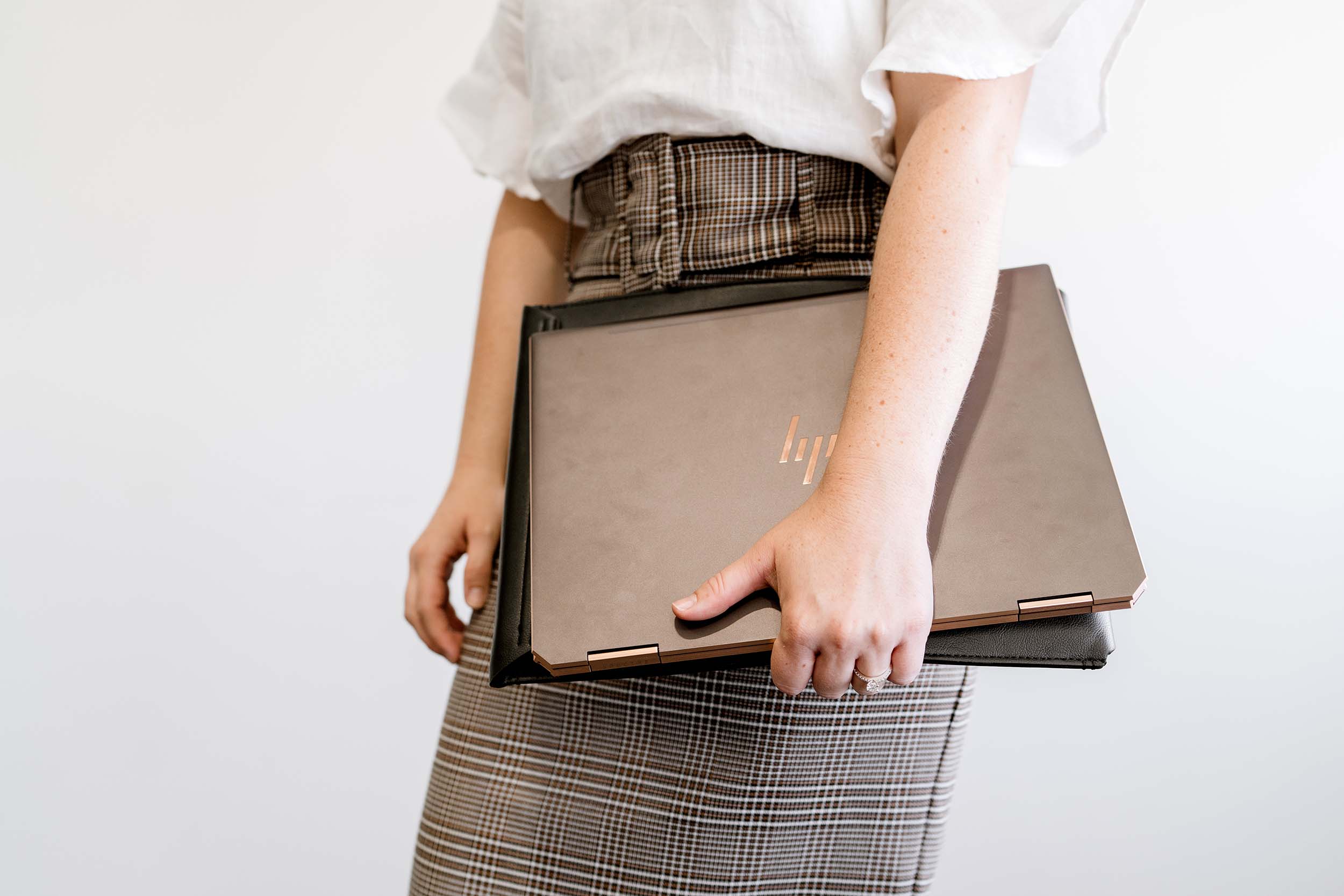 woman holding laptop ready for mediation and litigation case